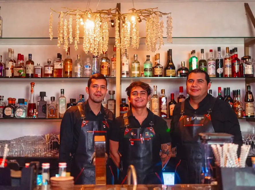 Mixologists at the bar of the White Rabbit Lie in Puerto Vallarta