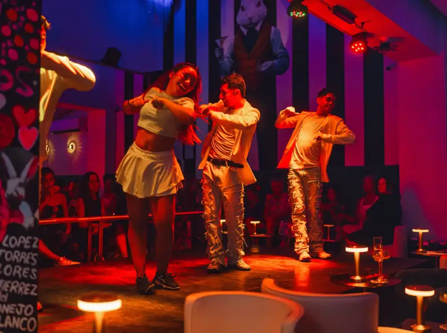 White Rabbit Lie dancers on stage